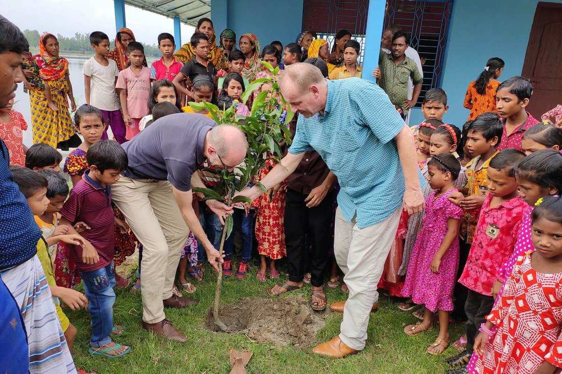 Students planting saplings during a One Student One Tree event